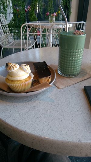 Lemon meringue cupcake, peanut butter slice, and gree smoothie at Tidbit Cakes - Online in Richmond