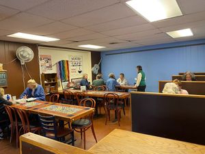 Eating area, between kitchen and book store. at Southland Books and Cafe in Maryville