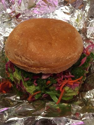 Smoky Beet Burger with avocado on GF bun at Two Tablespoons in Brooklyn