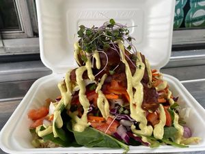 Specials - Lemon Curry Cauliflower Bowl w/ cabbage, carrot, tomato, and onion
 at Wrappin & Rollin in Roseburg