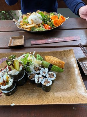 vegan sushi and tofu in peanut sauce with some veggies and rice at Mom's Creation - Alt Treptow in Berlin