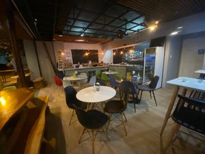 Seating area and bar at Nana Falafel & Juice Bar in San Jose