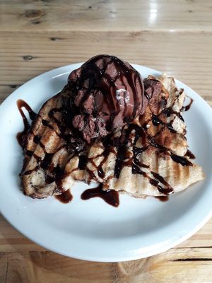 Rabetone (vegan panetone french toast with chocolate ice cream and chocolate syrup) at Viva la Vegan Bike Cafe in Curitiba