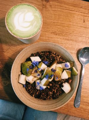 Nordic pear porridge and matcha latte  at 26 Grains in London