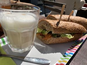 Healthy vegan sandwich with carrot hummus and vegetables.  at Frutsi in Mechelen