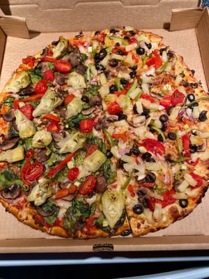 Half Vegetarian (Veggie) Pizza made Vegan style, and Half Vegan Tahitian Treat.  So good!! at Bluebird Pizza in Roseburg