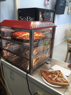 Pizza by the slice kept warm at Bluebird Pizza in Roseburg