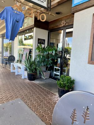 Storefront for A’a Roots - patio seating in frontt of  at a'a Roots Health Cafe in Lahaina