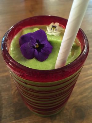Pina-kale-ada smoothie with coconut water, pineapple, banana, coconut meat, and kale. at a'a Roots Health Cafe in Lahaina