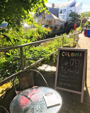 Seating by the river at Colours Cafe & Wellbeing Centre in Truro