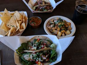 plantain tacos, eggplant tacos, patatas rojas, chips and salsa at Chisme Cantina in San Francisco