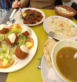 Sopa de lentejas, falafel, musaka, humus y pan de pita at Fenicia Vegetaria in Barcelona