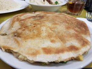 Pita stuffed with spiced potatoes and lettuce at Fenicia Vegetaria in Barcelona