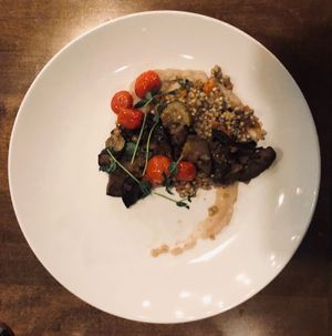Roast eggplant and zucchini w/ toasted buckwheat pilaf, confit tomato, rosemary white bean puree at Twisted Fern in Park City