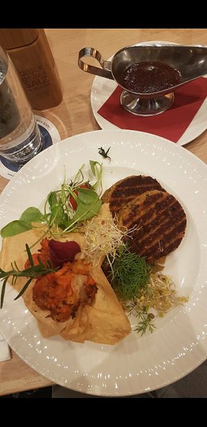 Hemp napkin dumplings with bavarian cabbage, yellow beets swirl and vegetable jus at Biohotel Garmischer Hof in Garmisch-partenkirchen