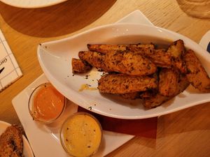 Kartoffelspalten mit (auf Nachfrage) veganen Soßen at Biohotel Garmischer Hof in Garmisch-partenkirchen