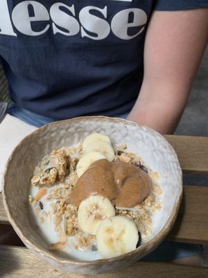 Granola with almond butter, banana and almond flakes at mymuybueno Deli in Mallorca