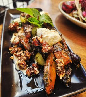 Roasted Carrots and Aubergine with Grapes, Candied Walnuts, Cashew Cream and Chimichurri Dressing at Atticus Finch in Rotorua