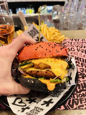 Chicken tenders, beef, cheese, lettuce, sauce, jalapeño slices: it’s a monster   at Vegan Junk Food Bar - De Pijp in Amsterdam