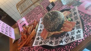 The Royal Smash Burger with sweet potato fries. at Vegan Junk Food Bar - De Pijp in Amsterdam