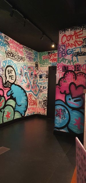 More of the graffiti wall at Vegan Junk Food Bar - De Pijp in Amsterdam