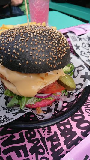 burger with vegan cheese and meaty patty - soo tasty  at Vegan Junk Food Bar - De Pijp in Amsterdam