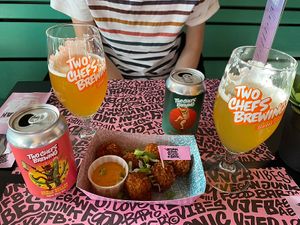 Mac and cheese bitterballs, tropical ralphie and green bullet💛  at Vegan Junk Food Bar - De Pijp in Amsterdam