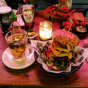 burger with ginger tea at Vegan Junk Food Bar - De Pijp in Amsterdam