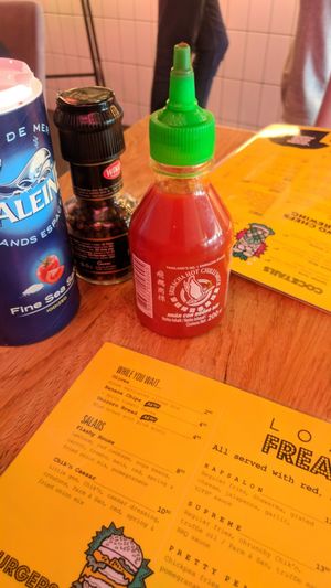 mini sriracha on the table was so cute at Vegan Junk Food Bar - De Pijp in Amsterdam