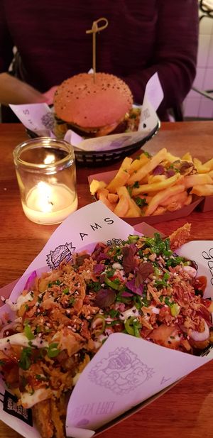 Burger and freak fries! at Vegan Junk Food Bar - De Pijp in Amsterdam