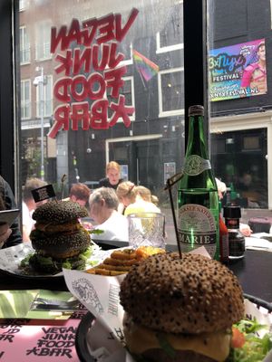Daddy McChikin and Original Burger with waffle fries  at Vegan Junk Food Bar - De Pijp in Amsterdam
