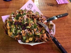 Kapsalon: crispy fries buried under vegan shoarma at Vegan Junk Food Bar - De Pijp in Amsterdam