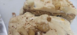 Sour Cream Pumpkin Chai bread with Peanut Butter vanilla Creamsicle buttercream and white chocolate chips at The Pizza Patio in Flagstaff