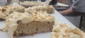 Sour Cream Pumpkin Chai bread with Peanut Butter vanilla Creamsicle buttercream and white chocolate chips from Heaven Sent Foods at The Pizza Patio in Flagstaff