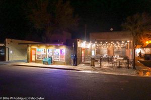 outside view of restaurant at night at The Pizza Patio in Flagstaff