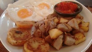 Potato and Taro Home Fries with organic free range eggs and homemade tomato chutney at Eden Eco Village in Kampot