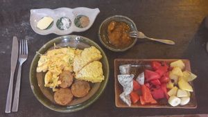 Sweet potatoes scones, handmade jam, fried green tomatoes, kampot pepper, fruit salad. Delicious breakfast at Eden Eco Village in Kampot