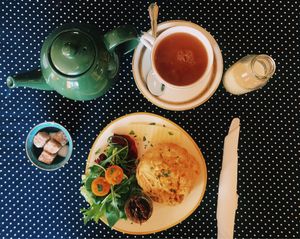 Yorkshire tea with oatmilk and a savory scone  at True Story in York