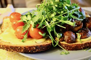 'Andy' - grilled cheddar cheese on granary bread topped with grilled tomatoes, herby mushrooms and rocket at True Story in York