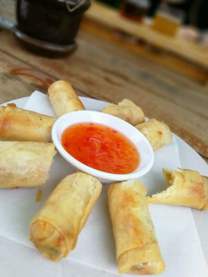 Korean veggie spring rolls & Cambodian craft beer sampler set at Moringa in Siem Reap