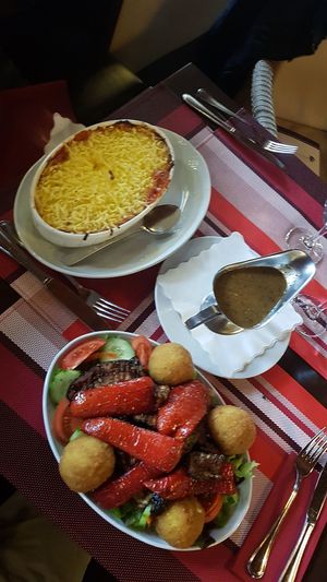 Vegan lasagna and arancine salute at Romikulum in Trier