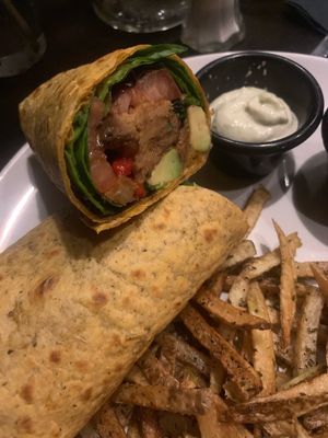Seitan wrap & fries! Very flavorful! The wrap tortilla was really tasty as well not just regular white flour. 🖤 at No5nyc & The Vegoist in Astoria