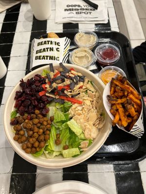 DIY salad, sweet potato fries, chik'n strips (made of jackfruit) - all delicious! The beet ketchup was especially good. at Beatnic - Rockefeller Plaza in New York City