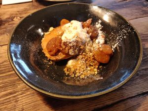 Sweet potato pancakes, dried apricot, coconut yoghurt, oat crumble and banana powder [£7.00] - Vegan at The Old Bicycle Shop in Cambridge