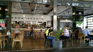 outside looking in at COOH Cafe in Alexandria