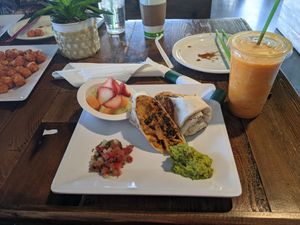 The Badass Vegan Burrito, Orange Burst smoothie, Loaded Sweet Potato Tots at VegeNation in Henderson