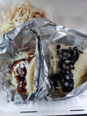 Black bean and plantain arepas witha side of slaw at Earth to Us  in Durham