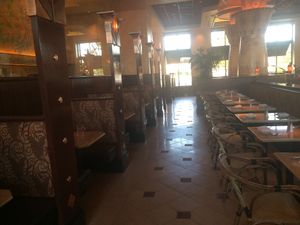 Seating booths and tables at The Cheesecake Factory in Pittsford