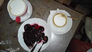 Vegan cake and vegan cappuccino at Cafe Bar 67 in Athens