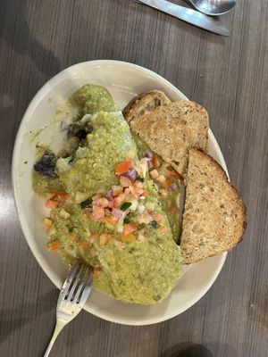 Breakfast burrito made vegan. The toast is not included that was from my wife’s meal.  at Snooze - Larimer St in Denver